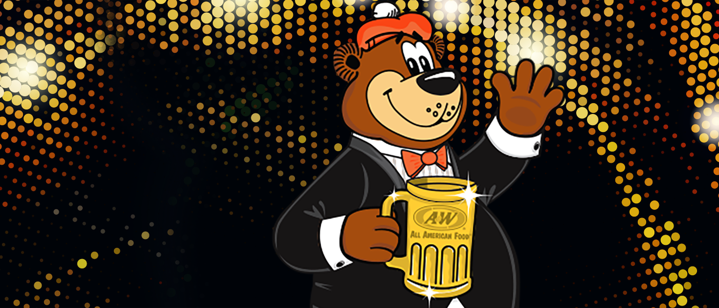 Rooty the Great Root Bear wearing tuxedo and holding gold A&W Mug